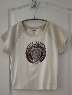 Roxy  Cream Tee with Beige Raglan Sleeves and Turtle Graphic